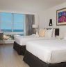 Zimmer mit 2 Doppelbetten, Warwick Paradise Island, Nassau, Bahamas - Credit: Warwick Hotel Paradise Island