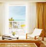 Suite mit Sitzbereich und Balkon, Palm Heights, Seven Mile Beach, Grand Cayman, CYM Credit: Palm Heights